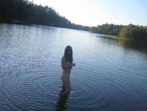 Naughty student with a furry pussy naked bathes in the lake. Thumb 9