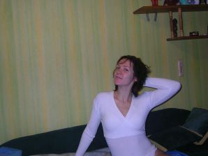 A naughty brunette with small breasts poses at the mirror. Thumb 7