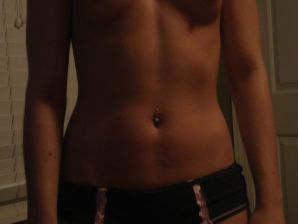 A pretty brunette drank in a bar and bared her breasts in front of a guy. Thumb 6