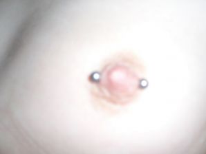 A student with a pierced nipple and tattoos undressed and showed a pussy. Thumb 10