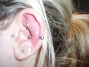 A student with a pierced nipple and tattoos undressed and showed a pussy. Thumb 33