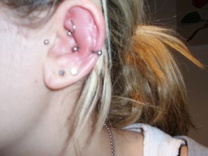 A student with a pierced nipple and tattoos undressed and showed a pussy. Thumb 35