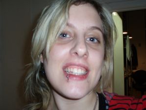 A student with a pierced nipple and tattoos undressed and showed a pussy. Thumb 7