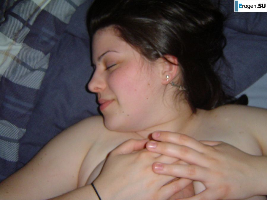 A naked girl shows her breasts, but is shy. Photo 10