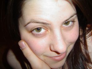 A naked girl shows her breasts, but is shy. Thumb 16