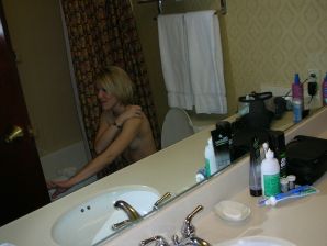 A pretty blonde is laid bare in the toilet and spreads her legs in bed. Part 3. Thumb 27