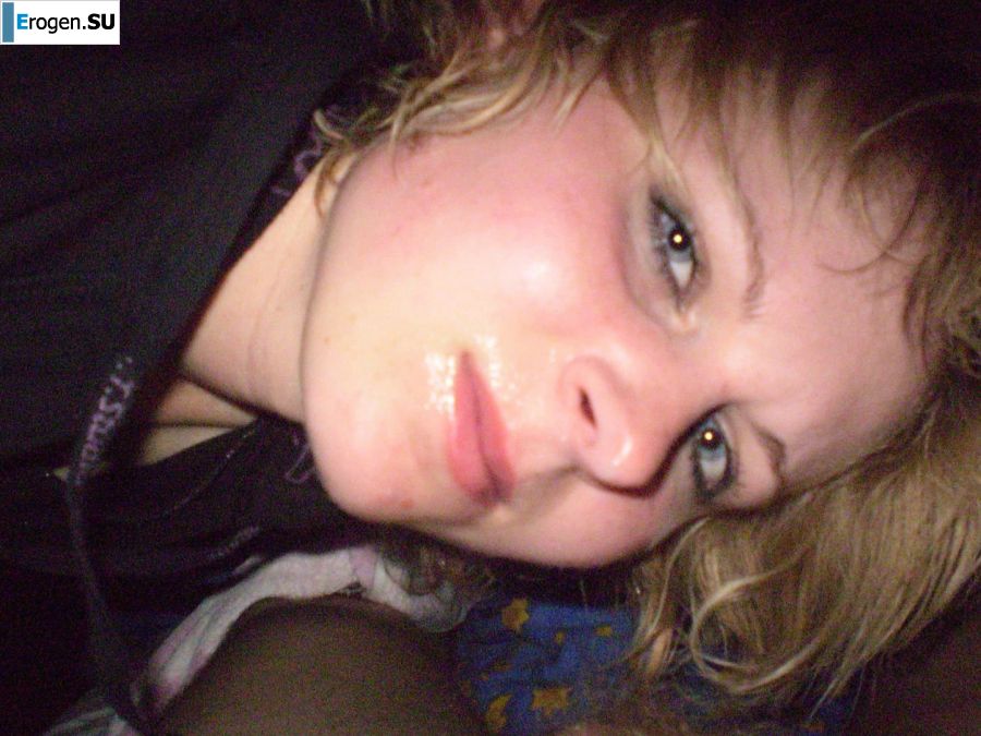 A young blonde in red lingerie stood up with cancer and spreads her pussy. Photo 4