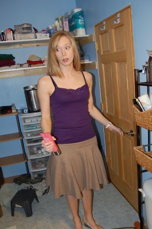 A slender woman with neat breasts takes off her clothes. Thumb 5