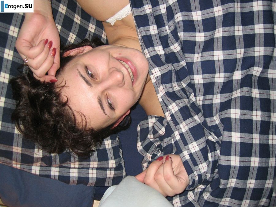 A curly-haired mature beauty is not shy about having sex on camera. Photo 15