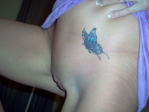 Seductive nurse masturbates on the couch. Thumb 26