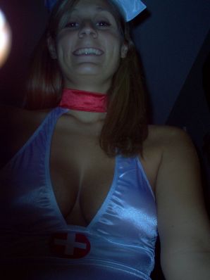 Seductive nurse masturbates on the couch. Thumb 33