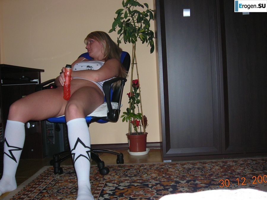 Appetizing blonde masturbates in front of the computer. Photo 26