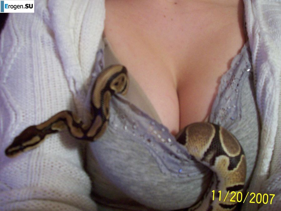 Passionate minx dances striptease in nature with a snake. Photo 42