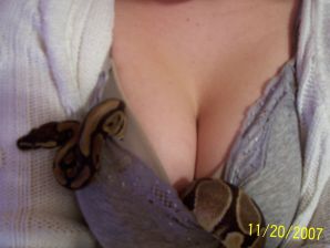 Passionate minx dances striptease in nature with a snake. Thumb 41