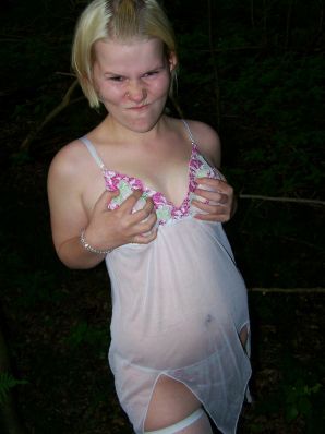 Appetizing magnificent blonde spread her legs right on the grass. Part 2. Thumb 23