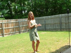 A blonde with a beautiful figure poses naked on the lawn. Part 4. Thumb 19