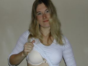 A blonde with a thin waist poses in front of her husband in the car and at home. Part 2. Thumb 31