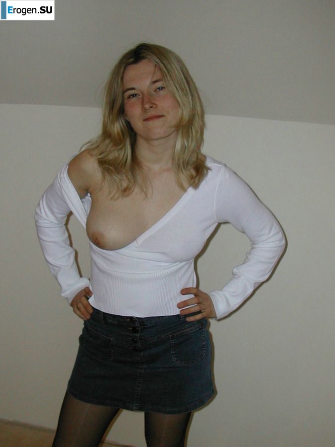 A blonde with a thin waist poses in front of her husband in the car and at home. Part 3. Photo 21