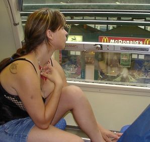 A lush woman bares her tits on the street and takes off her panties. Thumb 9